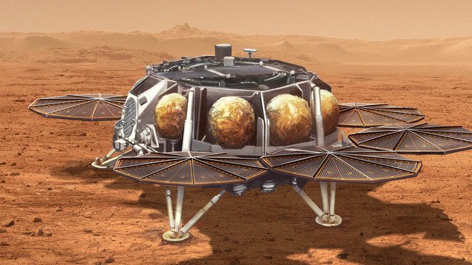 この図は、マーズ アセント ビークルと呼ばれる小さなロケット (長さ約 10 フィートまたは 3 メートル) を火星の表面に運ぶ NASA 向けの提案されたサンプル回収ビークルの概念を示しています。  NASA の Perseverance ローバーによって収集された火星の岩石と土のサンプルを含む密封されたチューブを搭載したロケットは、火星の軌道に飛び立ちます。 その後、サンプルは詳細な分析のために地球に運ばれます。