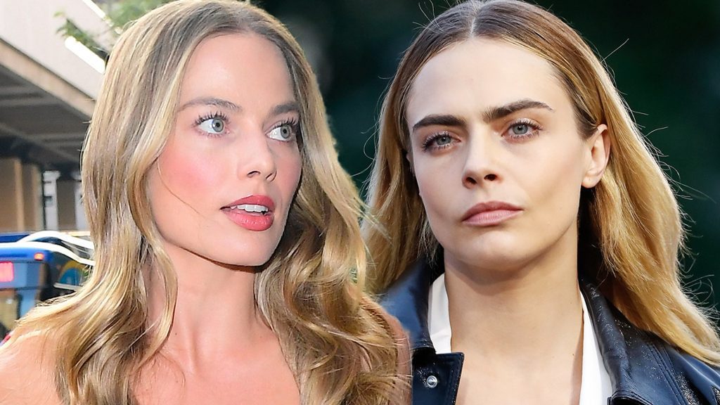 Margot Robbie と Cara Delevingne は、アルゼンチンの Photog によってボルトで固定され、友人を助けています