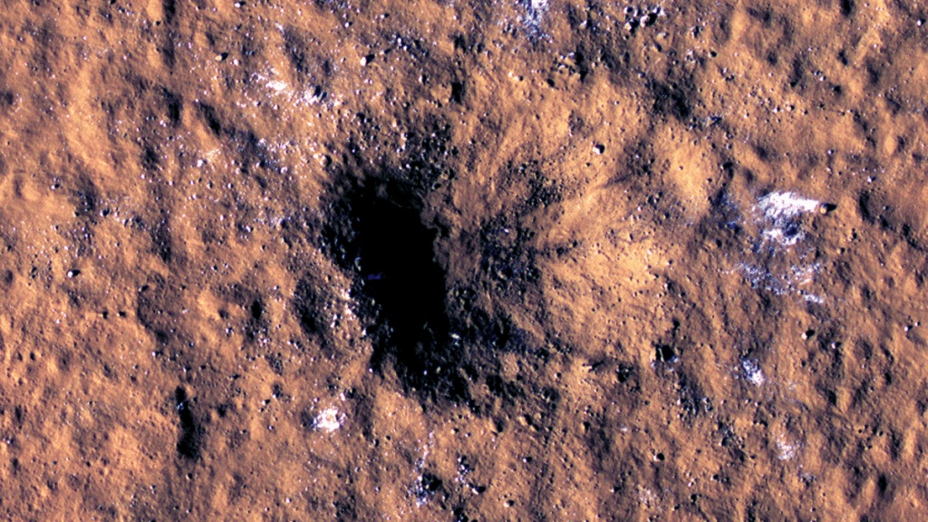 画像は、大きな隕石の衝突によって引き起こされた火星の新しいクレーターを示しています